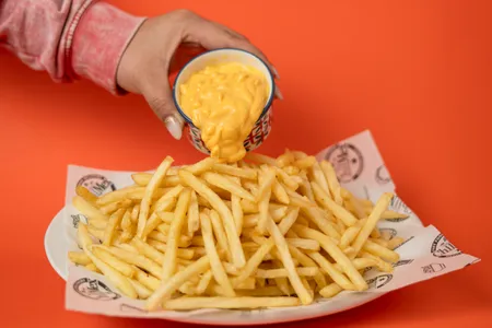 Papas fritas cheese tocino